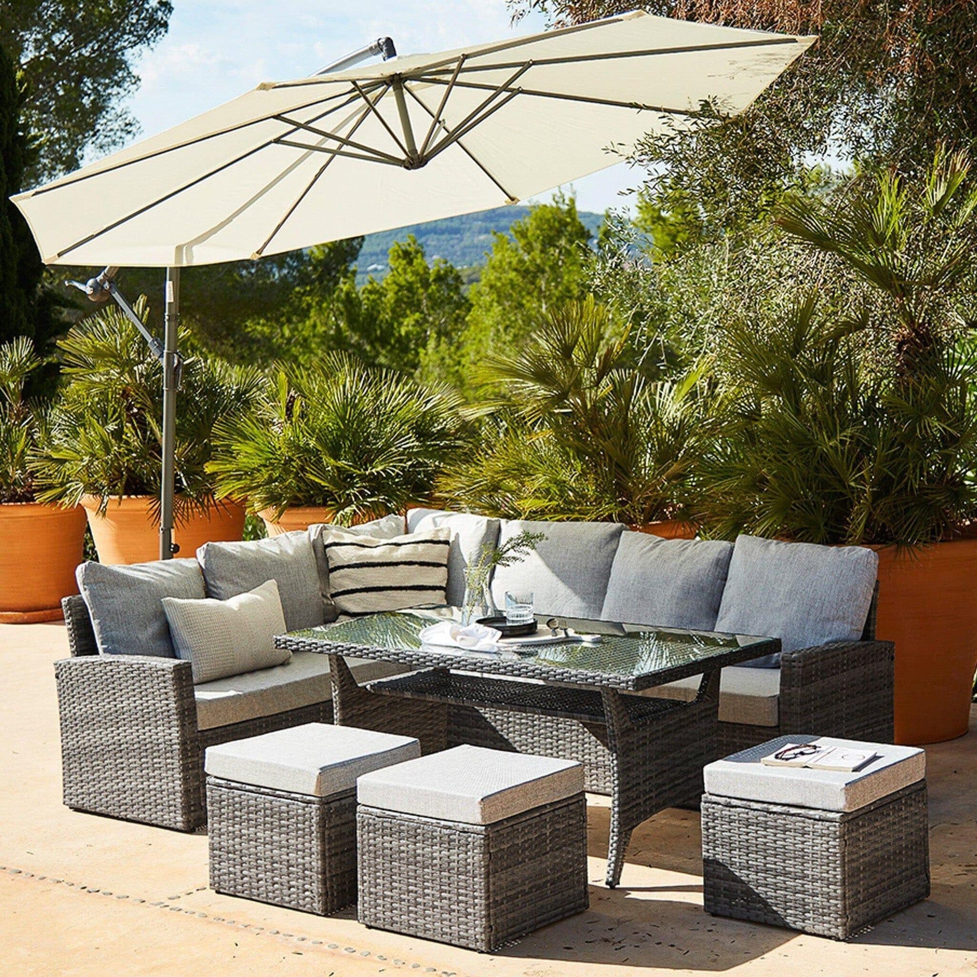 Aston 9 Seater Rattan Corner Sofa Set Cream Lean Over Parasol