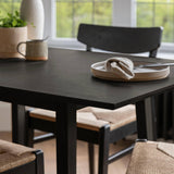 Charlie Black Extendable Dining Table Set - 4 Seater - Faye Woven Black Dining Chairs - Laura James