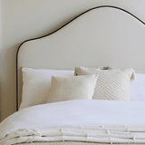 Odette King Size Ottoman Bed - Ivory - Jet Black Piping - Laura James