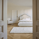 Odette King Size Ottoman Bed - Ivory - Jet Black Piping - Laura James