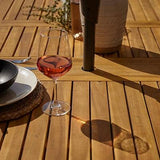 Oakley 4 Seater Wooden Extendable Round Garden Dining Table with 4 Rattan Dining Chairs - Laura James