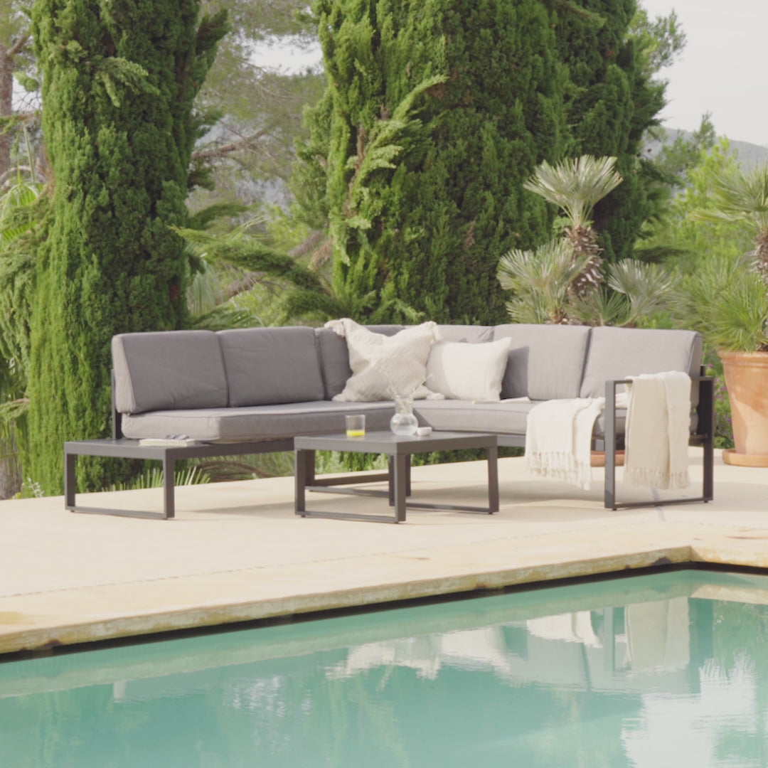Maia Garden Corner Sofa - Black - Right Hand Assembly - Cream Lean Over Parasol