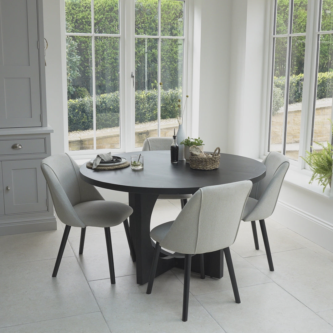 Jade-black-dining-table-oatmeal-chairs-laura-james