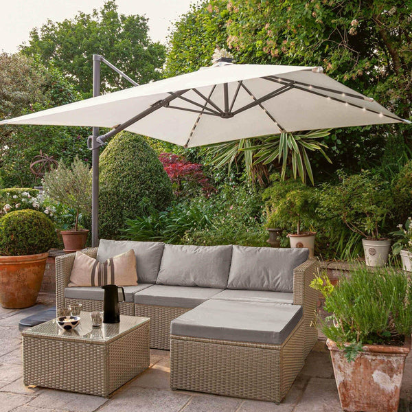 Weston Natural Rattan Corner Sofa Set & Cream LED Parasol - Laura James