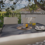 8 Seater Rattan Cube Outdoor Dining Set with Cream Parasol - Black Weave Polywood Top - Laura James