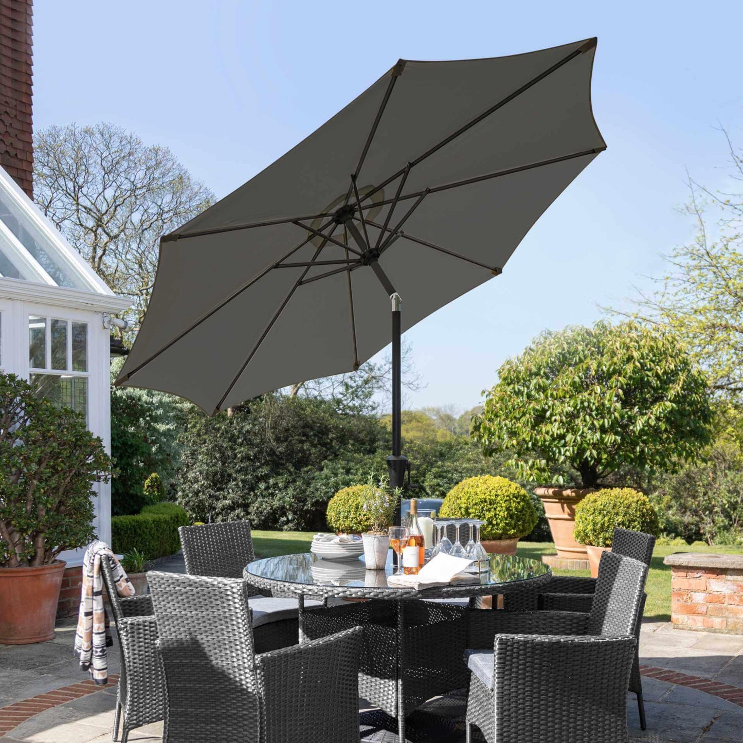 Kemble 6 Seater Rattan Round Dining Set with LED Premium Parasol and Parasol Rain Cover - Grey - Laura James