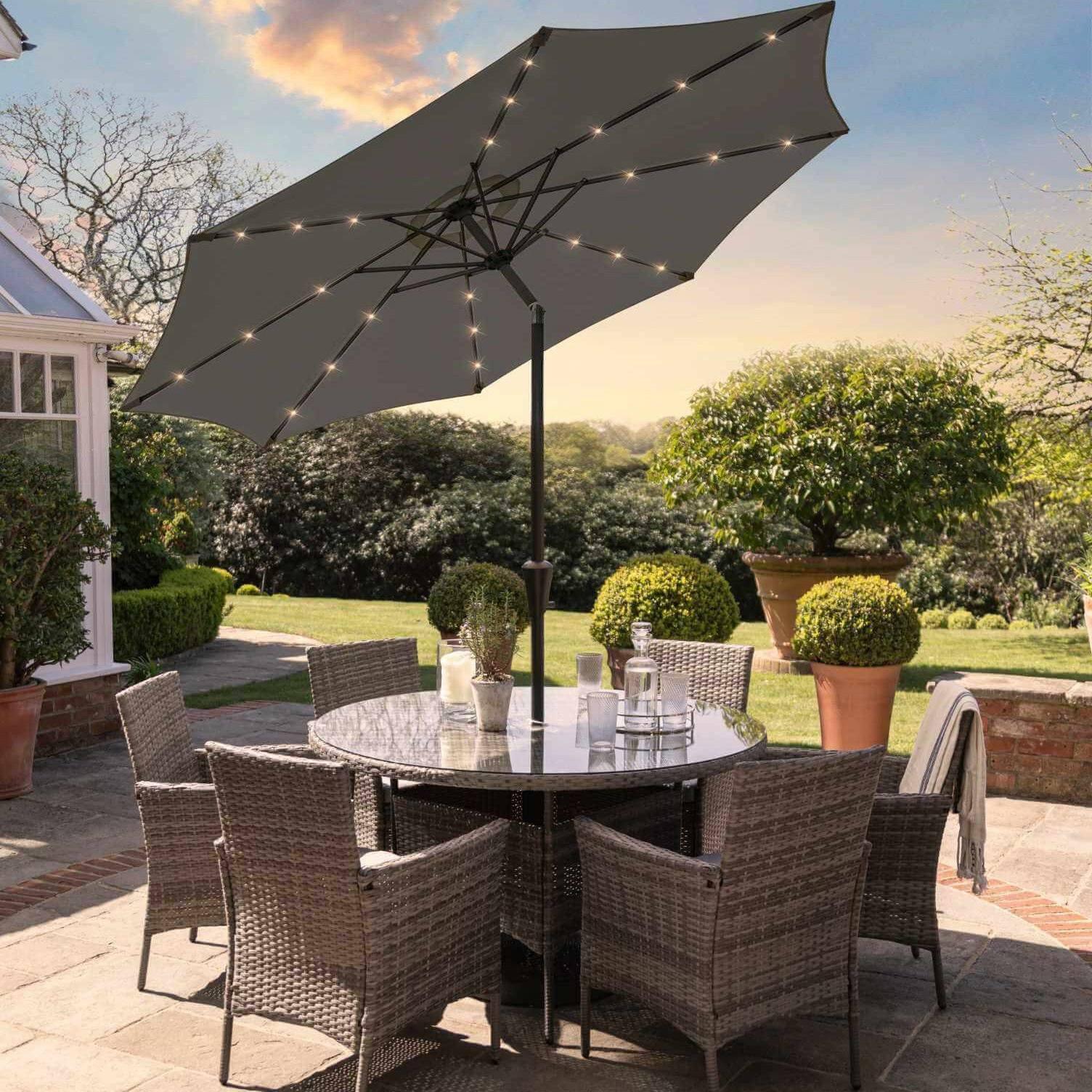 Kemble 6 Seater Rattan Round Dining Set LED Premium Parasol & Parasol Rain Cover