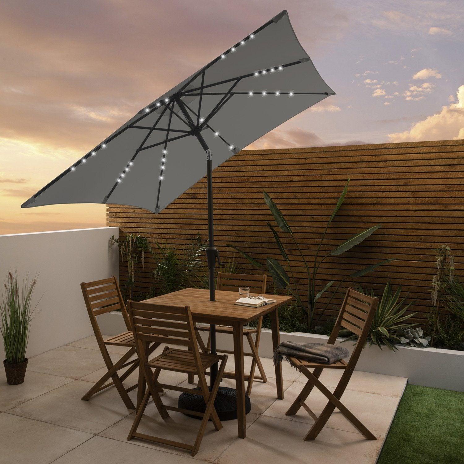 Ackley wooden garden furniture – 4 seater outdoor dining set with grey premium parasol - Laura James