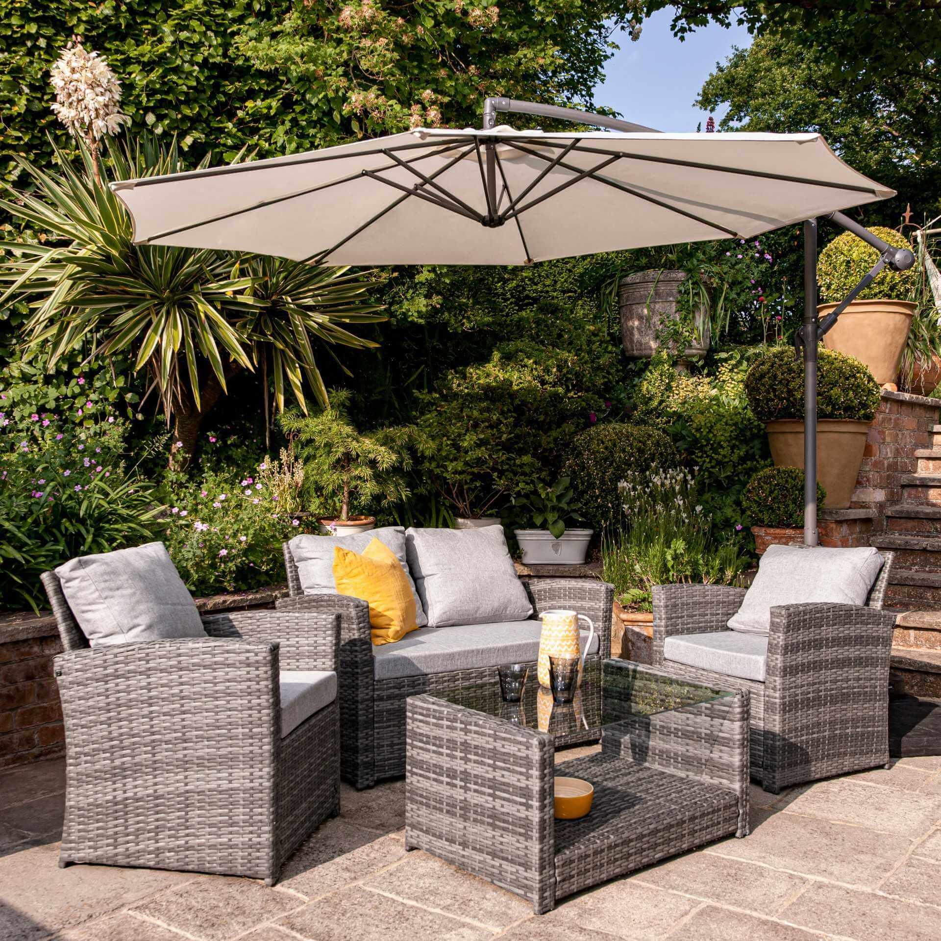 Cote Seater Rattan Garden Sofa Set with Cream Lean Over Parasol