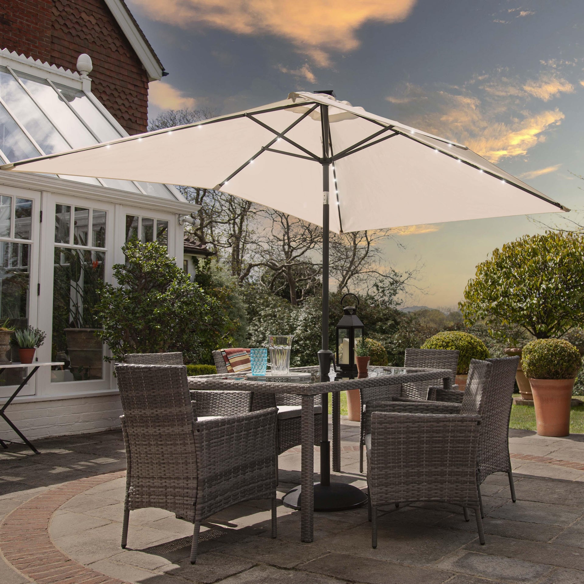 Marston 6 Seater Rattan Garden Dining Set Cream LED Premium Parasol Glass Top