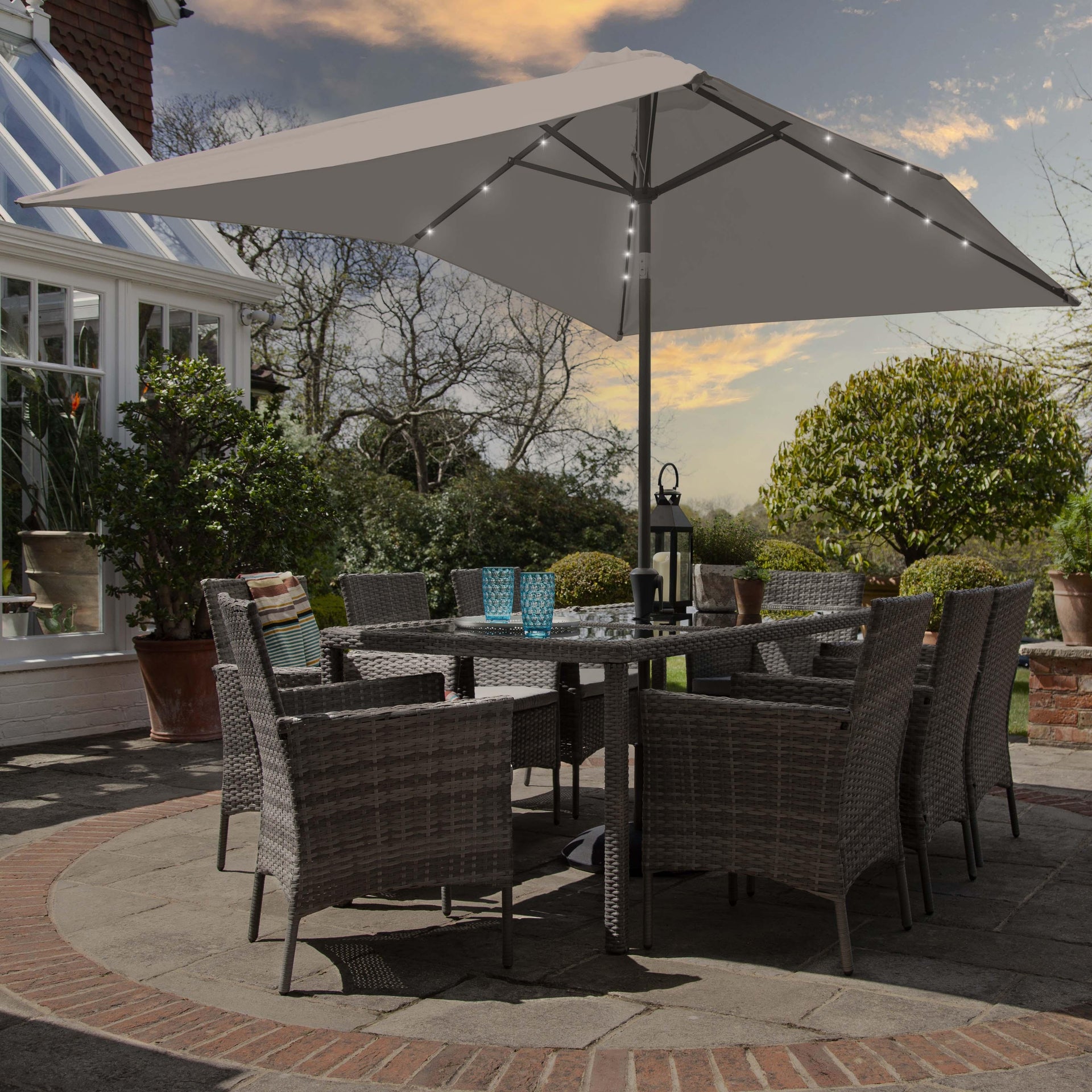 Marston 8 Seater Rattan Garden Dining Set LED Premium Parasol Glass Top
