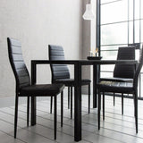 Outlet - Anya glass dining table set - 4 seater - black - Laura James